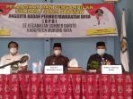 DPRD MURA SINERGITAS: Waket II DPRD Mura Rahmanto Muhidin (paling kanan) disela kegiatan pelantikan anggota BPD Kecamatan Sumber Barito, Rabu (28/7). (FOTO: DADANG/KALTENG POS)