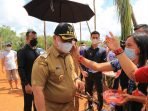 acara ritual tiwah yang digelar di Desa Bukit Raya ACARA ADAT: Bupati Kotim, H Halikinnor menghadiri acara ritual tiwah yang digelar di Desa Bukit Raya, belum lama ini. (FOTO: HUMAS UNTUK KALTENG POS)
