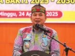 SAMBUTAN: Bupati Bartim M Yamin ketika memberikan sambutan saat pelantikan dan pengukuhan pengurus KKD Dusmala, belum lama ini.