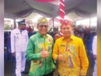 MEMPERINGATI: Ketua Komisi I DPRD Murung Raya, Rejikinoor (kiri) menghadiri peringatan Hari Jadi ke 23 Mura, kemarin.