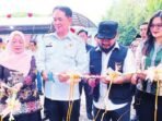 PEMBUKAAN: Bupati Barito Timur, Muhammad Yamin, didampingi Wakil Bupati Adi Mula Nakalelu, membuka Expo UMKM, belum lama ini.