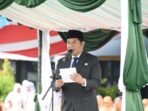 Wakil Bupati Felix saat menyampaikan amanat Mentri Agama Republik Indonesia pada upacara peringatan Hari Amal Bakti ke-80 di lingkup Pemerintah Kabupaten Barito Utara, Sabtu (3/1).
