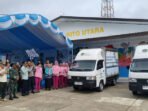 Sekda Muhlis bersama Kapolres Barito Utara, Singgih Febriyanto saat pelepasan mobil SPPG yayasan Kemala Bhayangkari, Jumat (13/2).