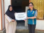 Sofia, warga Desa Kapuh, Kandangan, yang kini dapat menikmati listrik secara mandiri di rumahnya tanpa bergantung pada pihak lain, berkat bantuan pasang baru gratis lanjutan program Terang Berkah PLN UID Kalselteng.