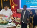 Bupati Lamandau, Rizky Aditya Putra, menghadiri program nikah massal gratis yang digelar oleh Pemkab Lamandau, belum lama tadi.