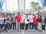 Bupati Barito Utara H Shalahuddin ST MT ditemani Wakil Bupati Barito Utara Felix Sonadie Y Tingan A Md beserta jajaran saat Gowes Pagi sekaligus meninjau kebersihan kota dan siring Waterfront City, Minggu (7/6).