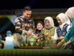 Bupati Lamandau, Rizky Aditya Putra, saat menghadiri sekaligus membuka rangkaian peringatan Hari Jadi ke-21 Kecamatan Menthobi Raya, belum lama ini.