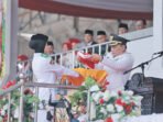 Barito Utara Batara, H Shalahuddin memimpin upacara memperingati Hari Ulang Tahun (HUT) ke- 81 Kemerdekaan Republik Indonesia, di Arena Terbuka Tiara Batara, Muara Teweh, Senin (17/8)