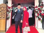 Anggota DPRD Kabupaten Barito Utara Patih Herman AB didampingi isteri saat menghadiri peringatan HUT ke 81 Kemerdekaan RI di arena Tiara Batara Muara Teweh, Senin (17/8).