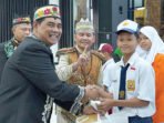 Bupati Barito Utara, H Shalahuddin ST MT (Tengah) memaparkan capaian Program 11.12 GASPOL dalam agenda Refleksi Satu Tahun Kepemimpinan di Gedung Balai Antang, Muara Teweh, Selasa (6/10).